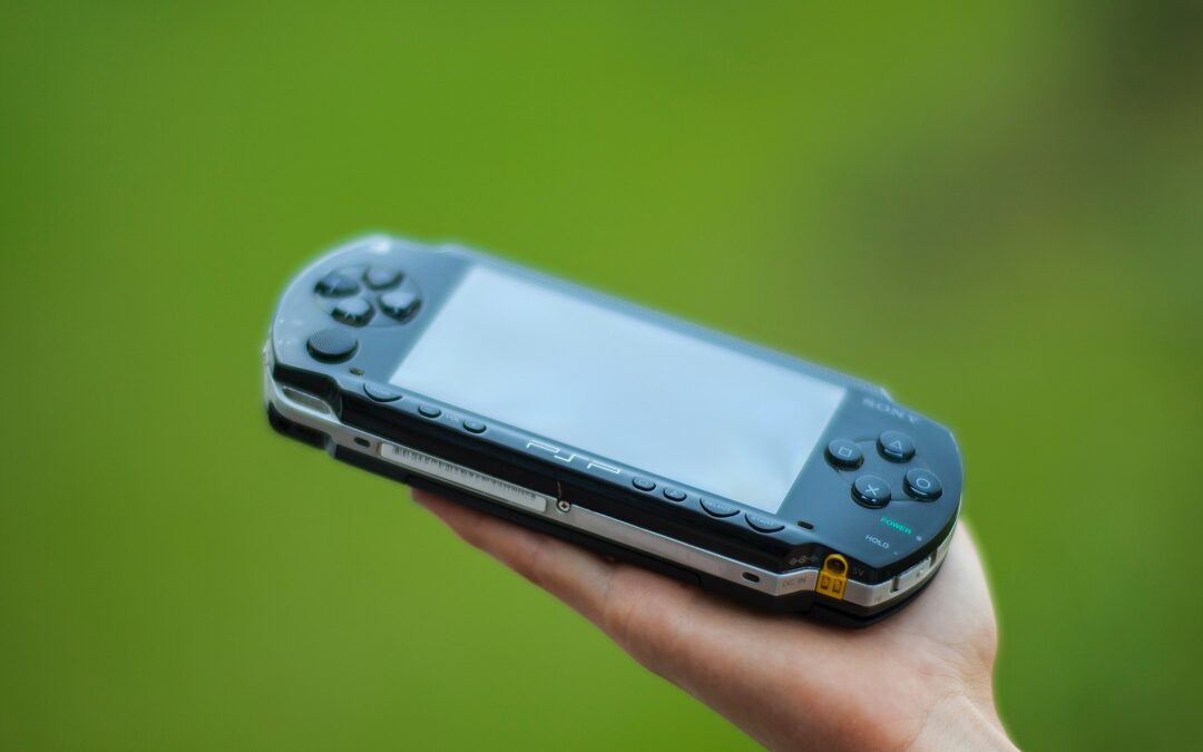 PSP console in hand